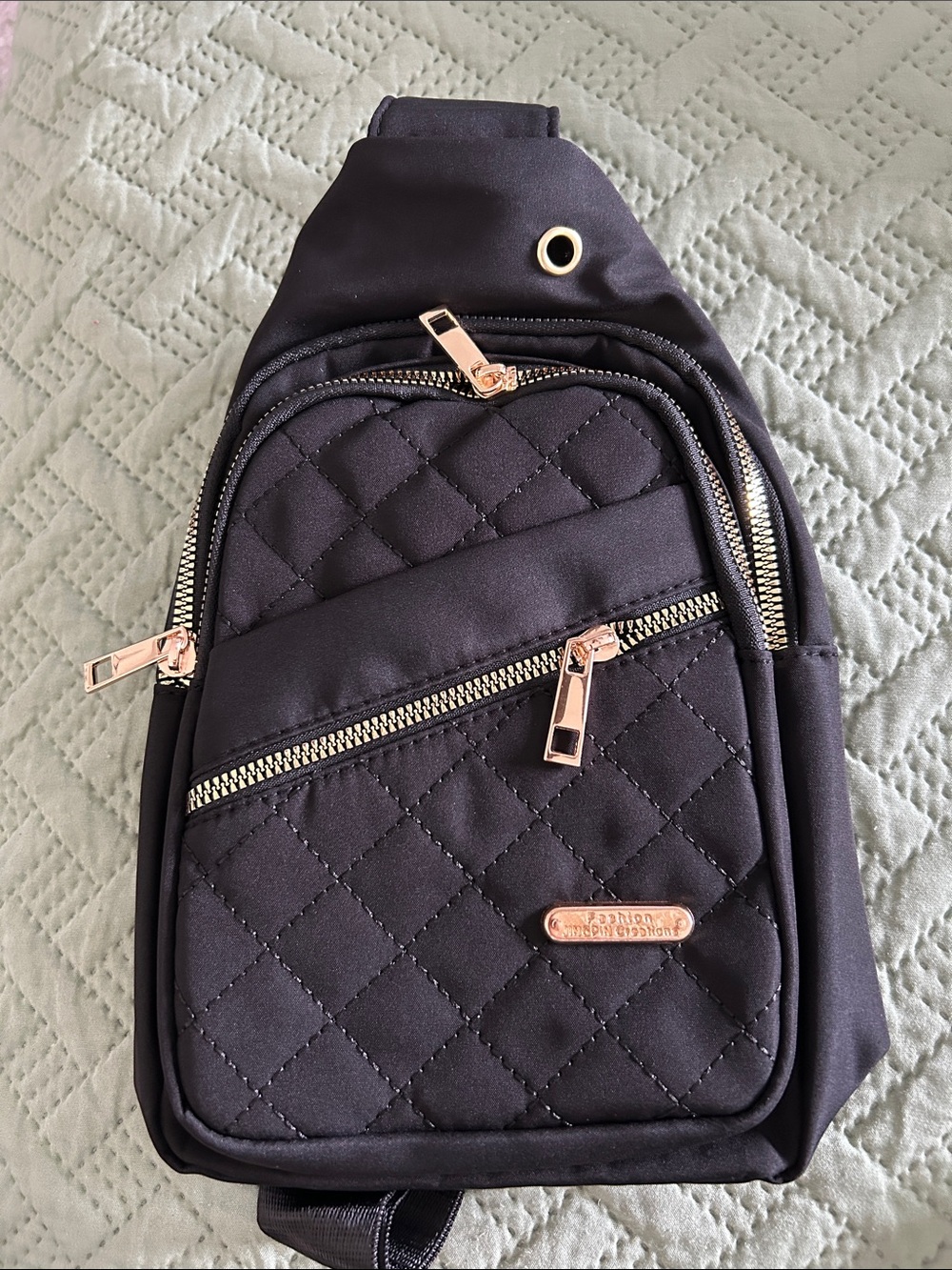 Black Quilted Sling Crossbody Bag with Gold Hardware